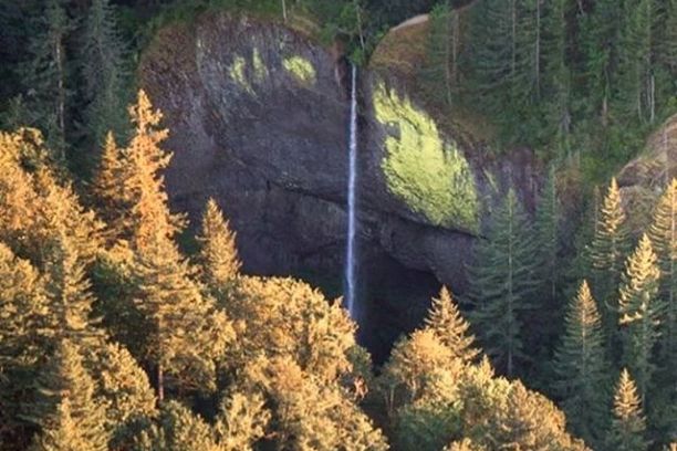 Aerial view of rushing waterfall in Oregon